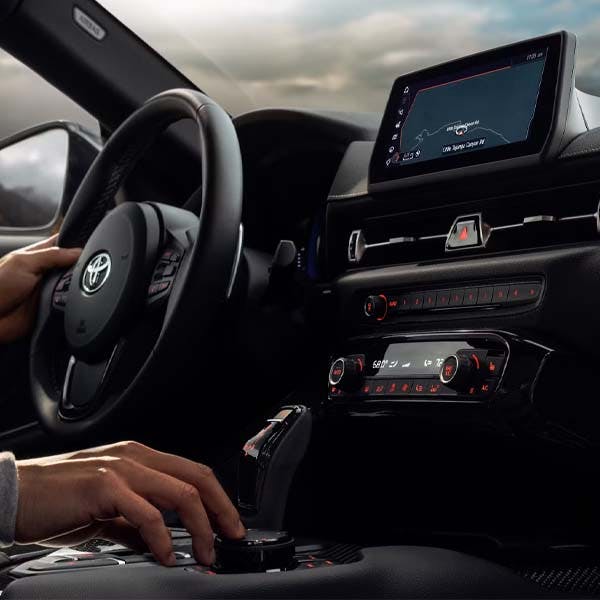Interior dashboard and steering wheel of 2025 Toyota GR Supra.