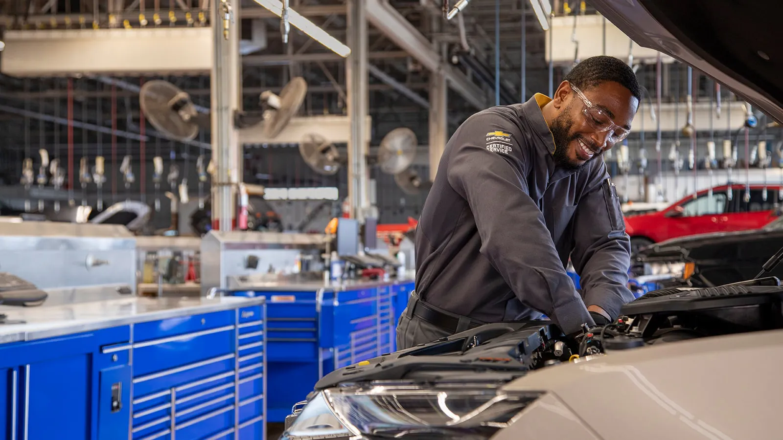 service tech working on a transmission