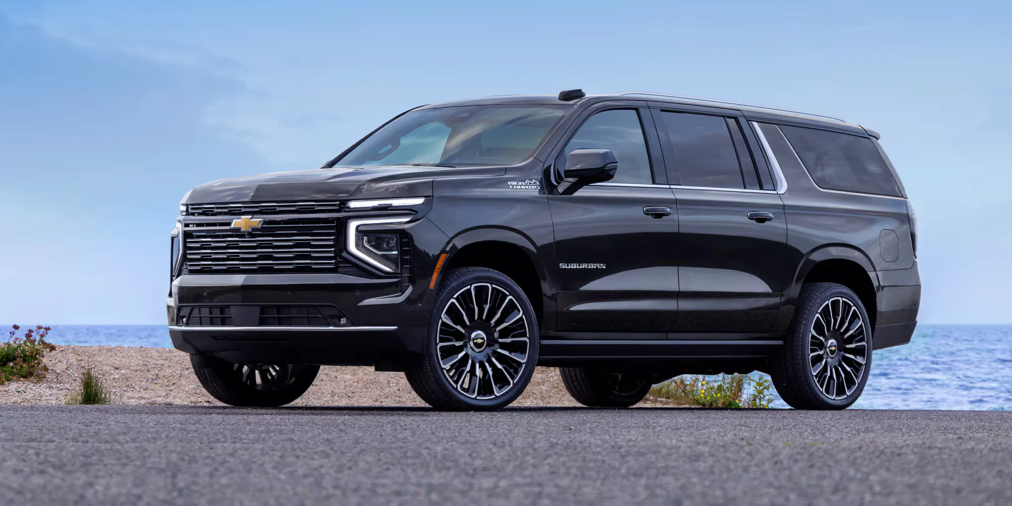 2025-suburban-mov-gallery-ext-07 A black suburban sitting parked.