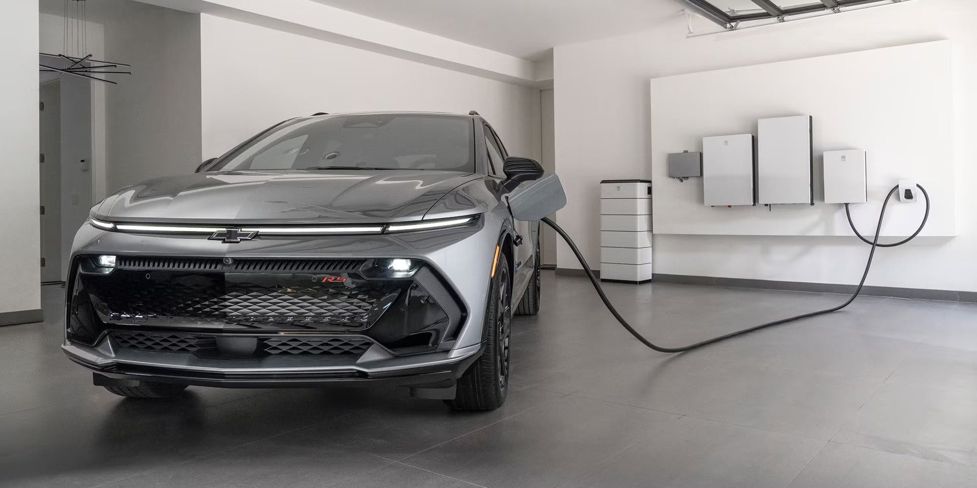 equinox ev plugged into a charger