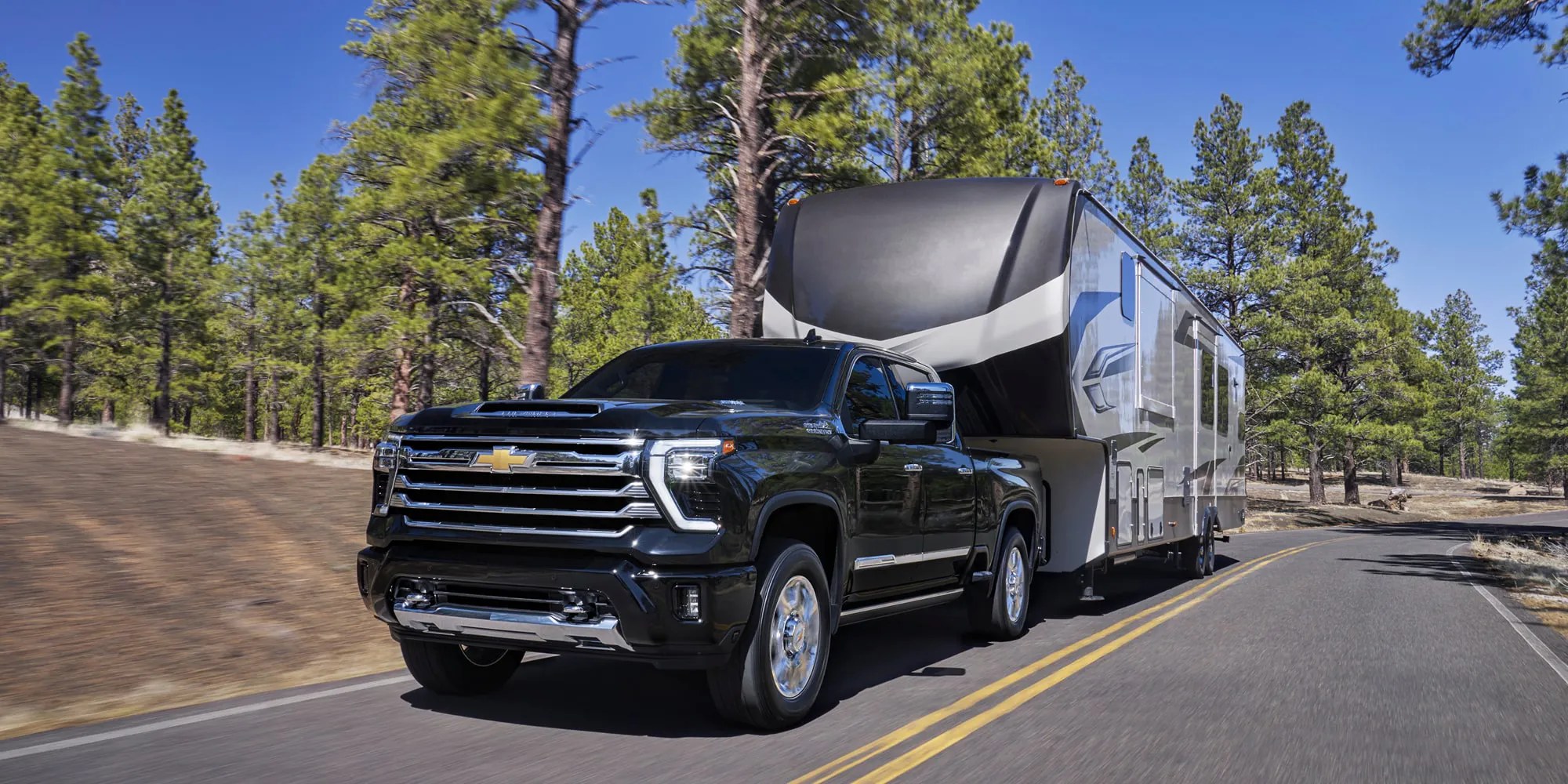 a silverado 2500 hauling a camper