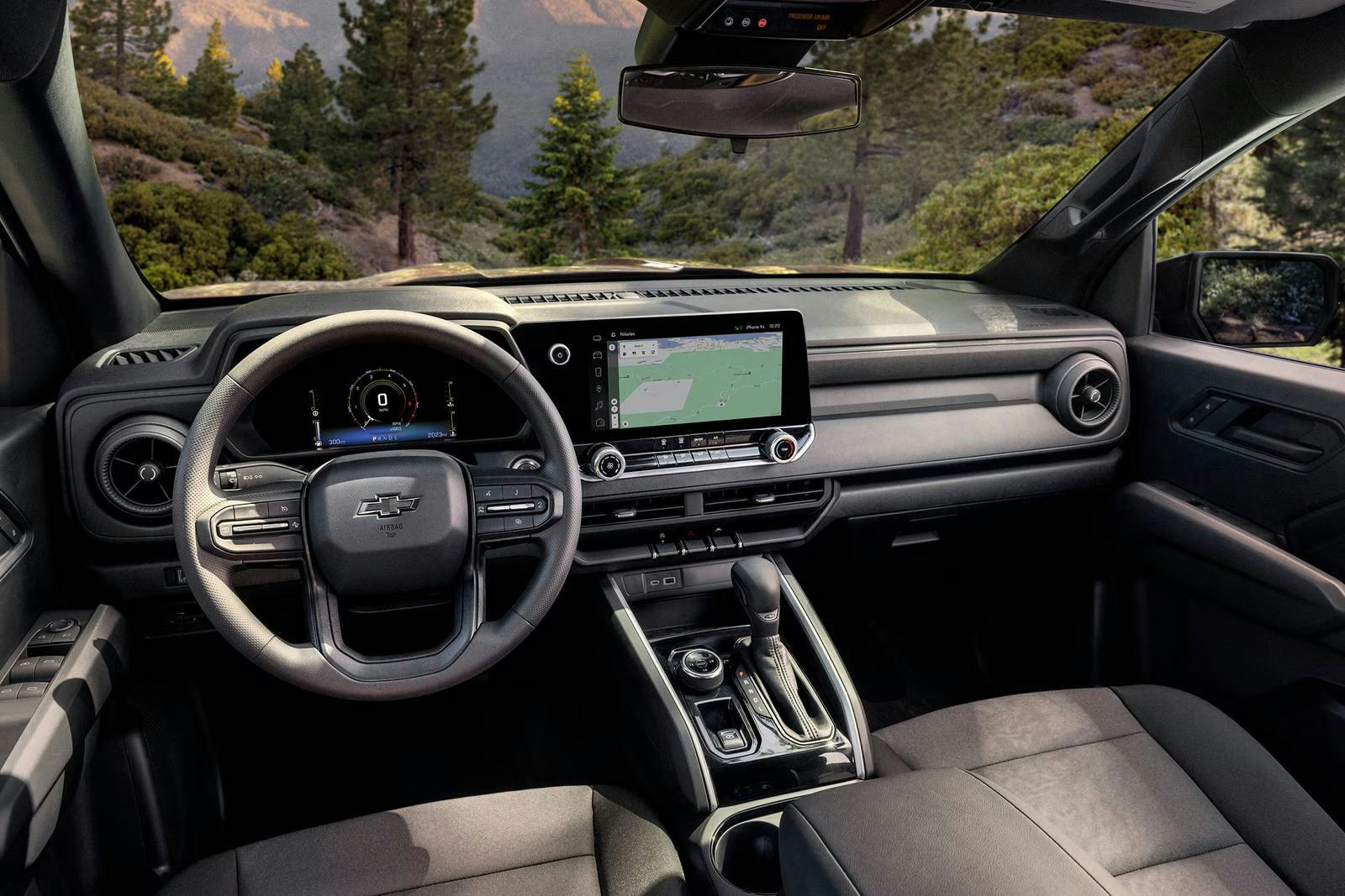 2026_chevrolet_colorado_crew-cab-pickup_trail-boss_d_oem_1_1600x1067 The front display screen in a colorado.