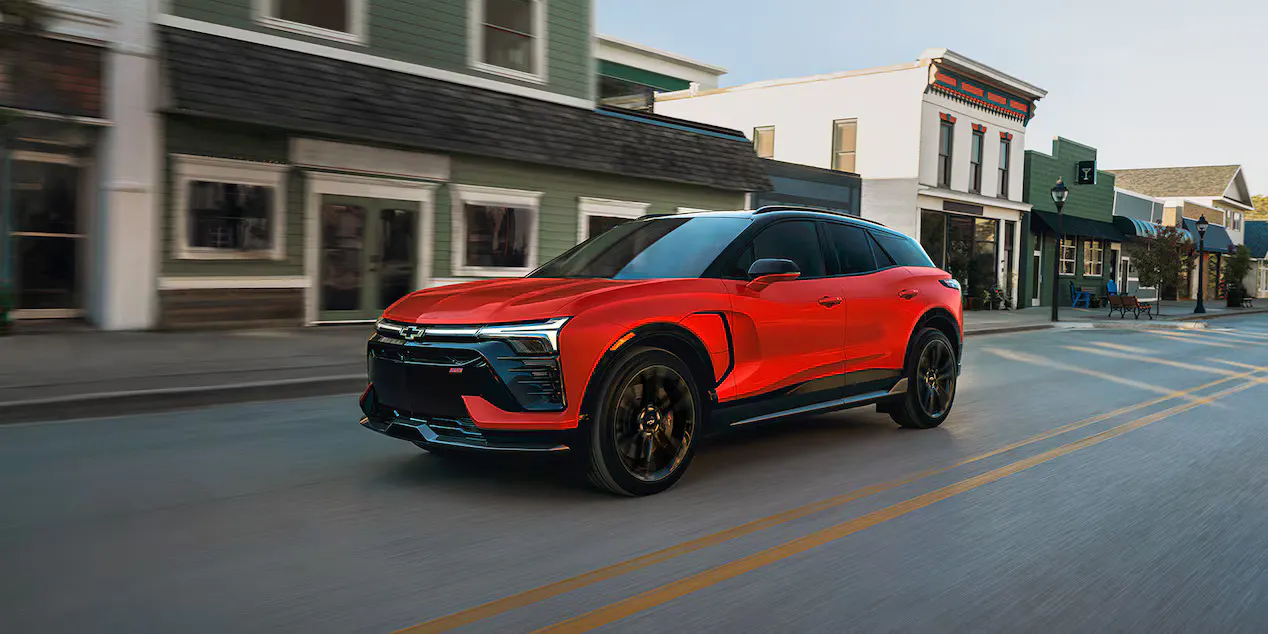 A chevy blazer ev driving on the road.